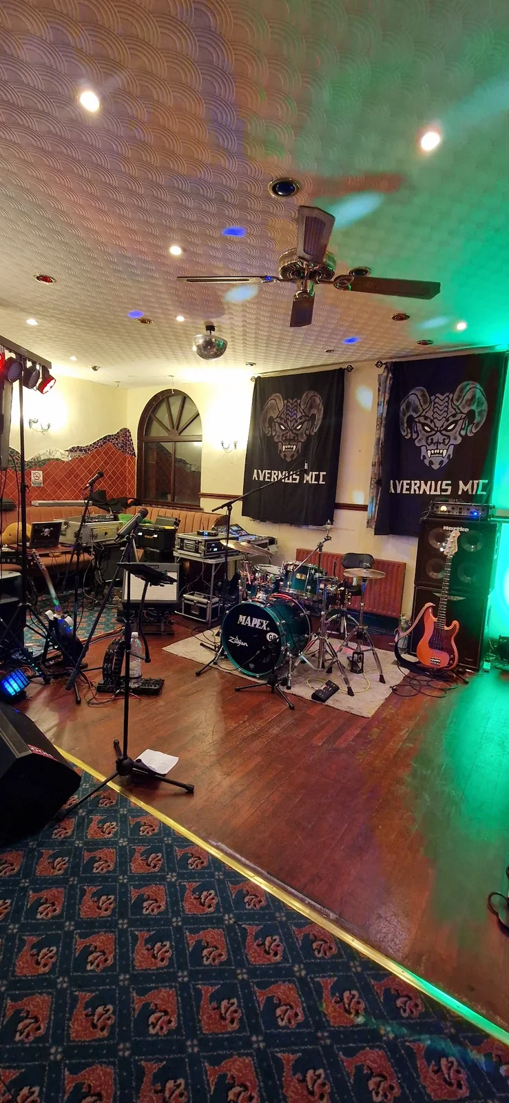 Electric Outlawz equipment set up on a venue stage